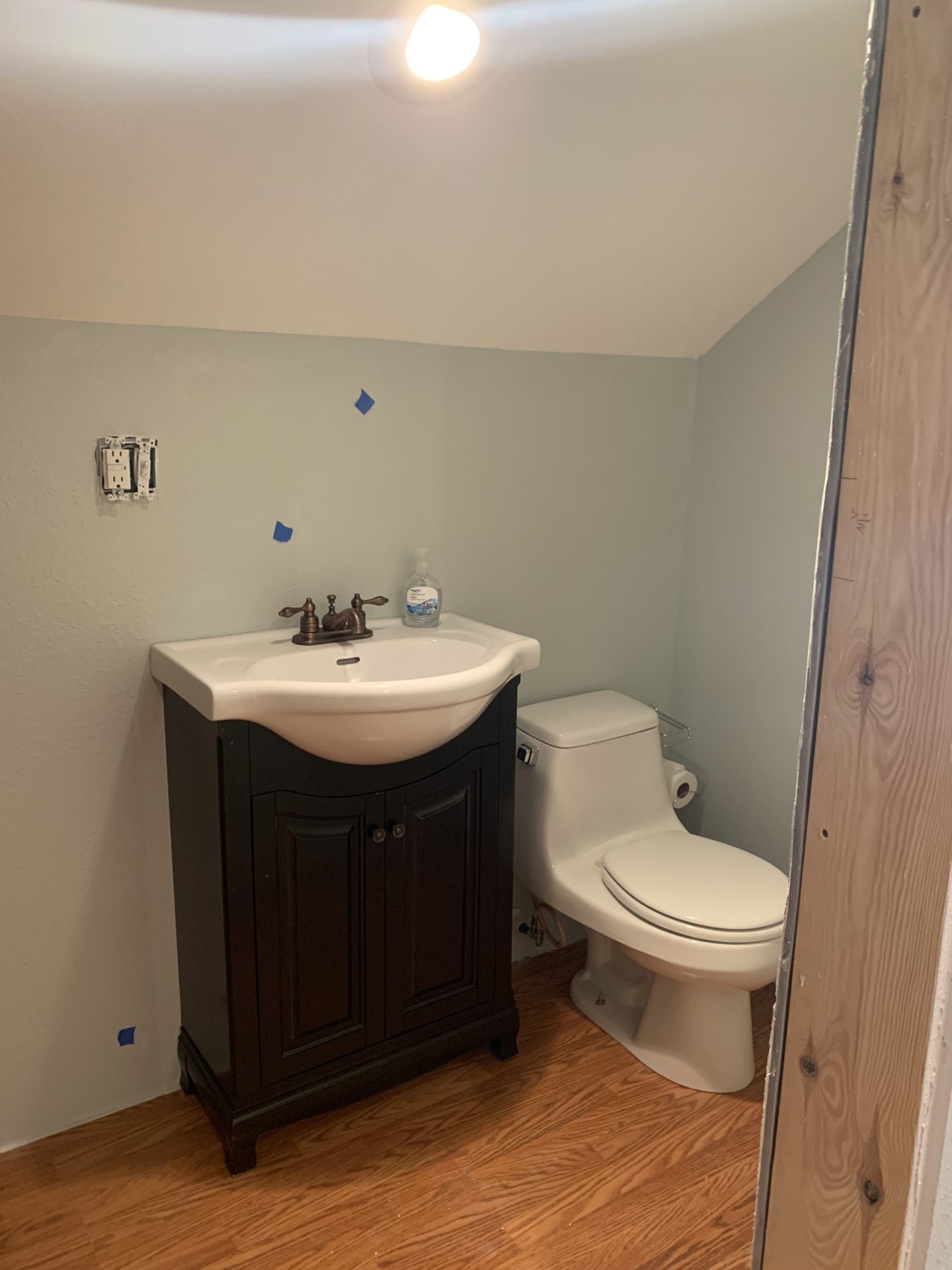 Upstairs bathroom toilet and vanity from downstairs bathroom installed